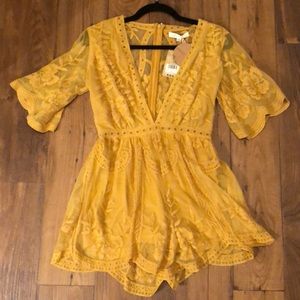 Honey Punch mustard yellow deep v lace romper!